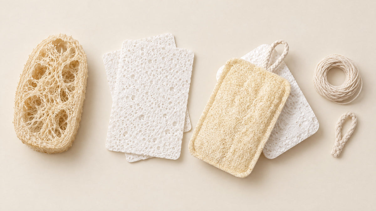The three materials the sponge is made from - dried loofah gourd, wood pulp cellulose sheets and natural cotton thread - laid out beside the finished sponge